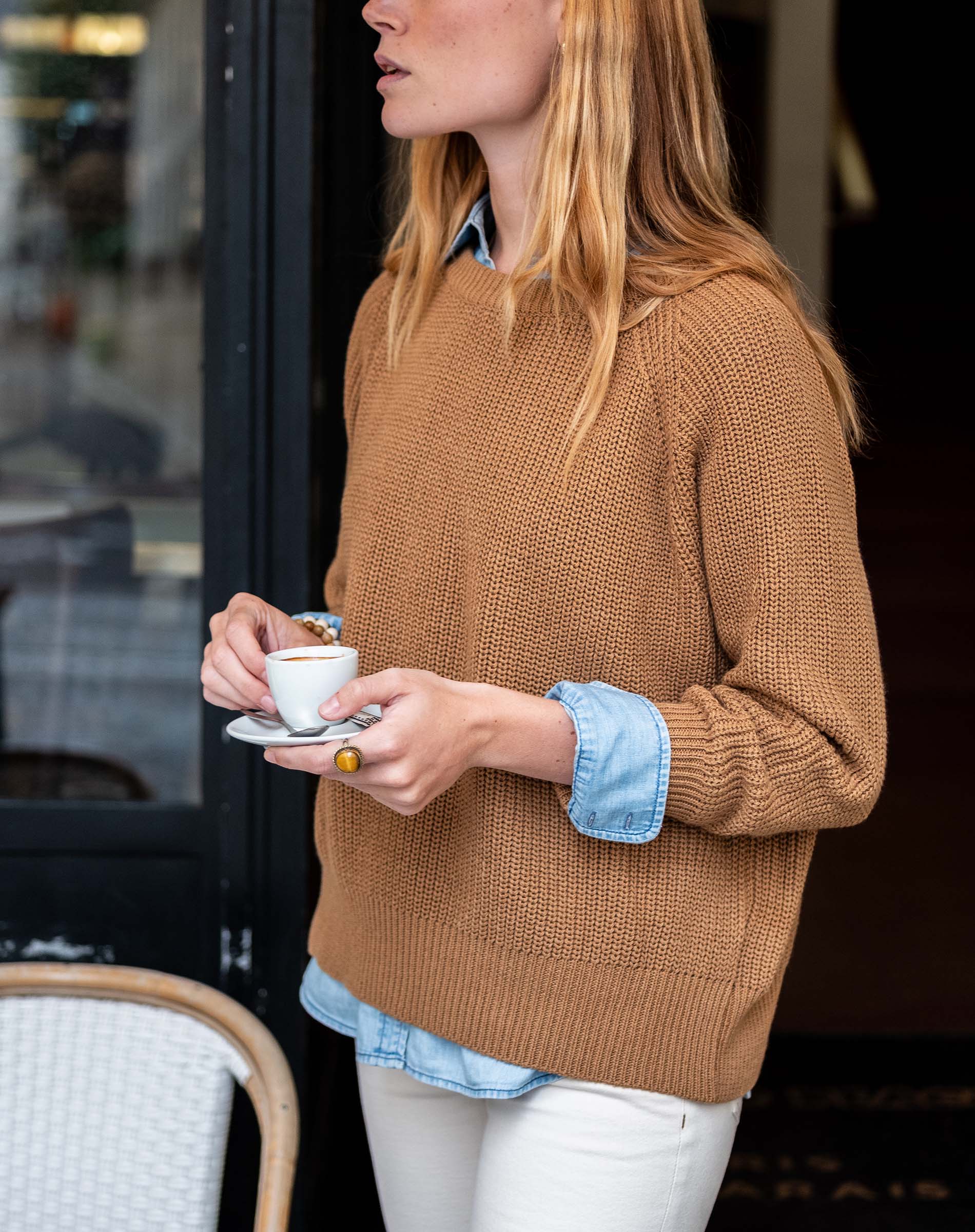 Tobacco-colored knit crewneck sweater with a textured weave.