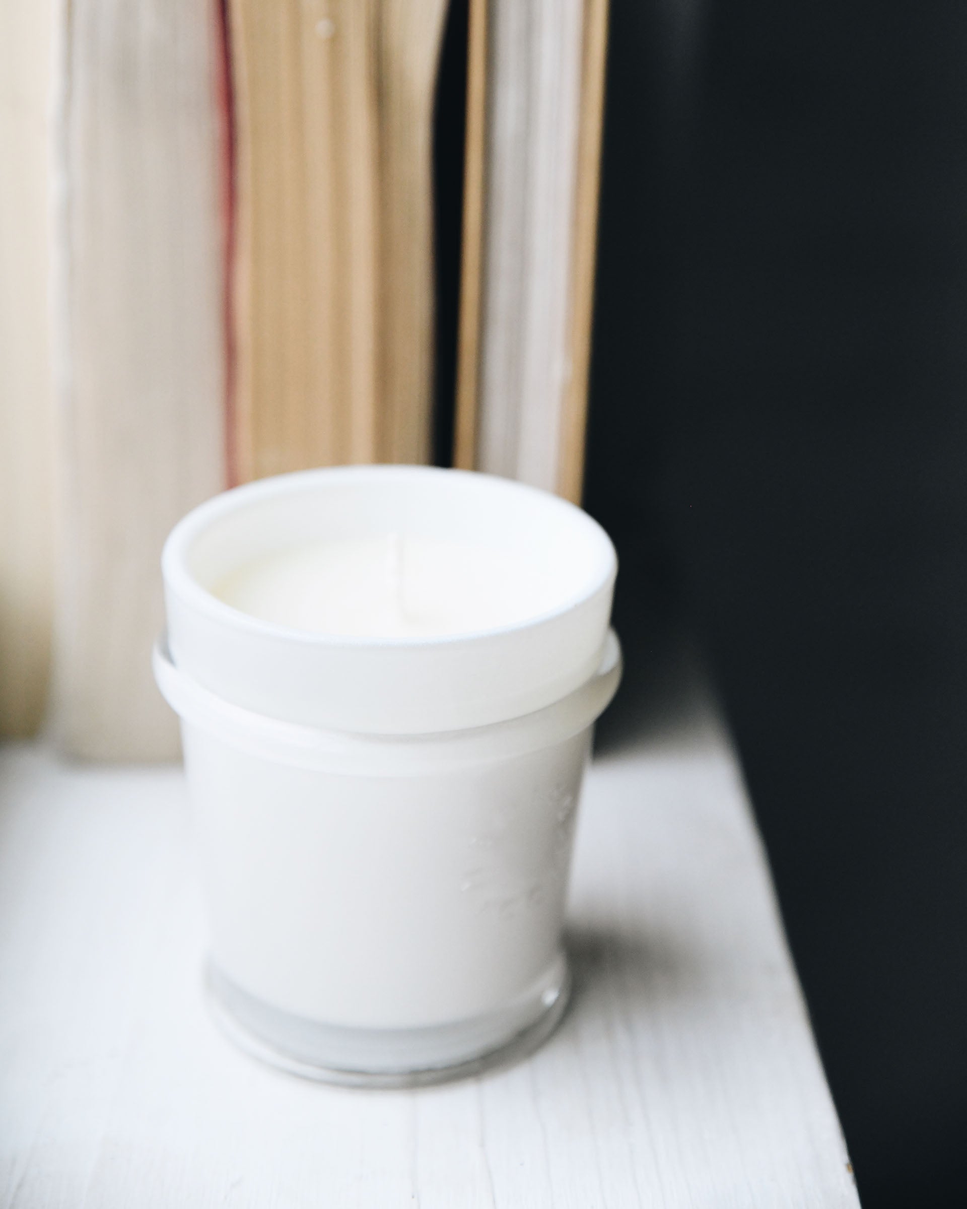 sandbag candle unlit on windowsill 