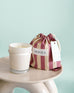 summer in provence sandbag candle with blue green backdrop