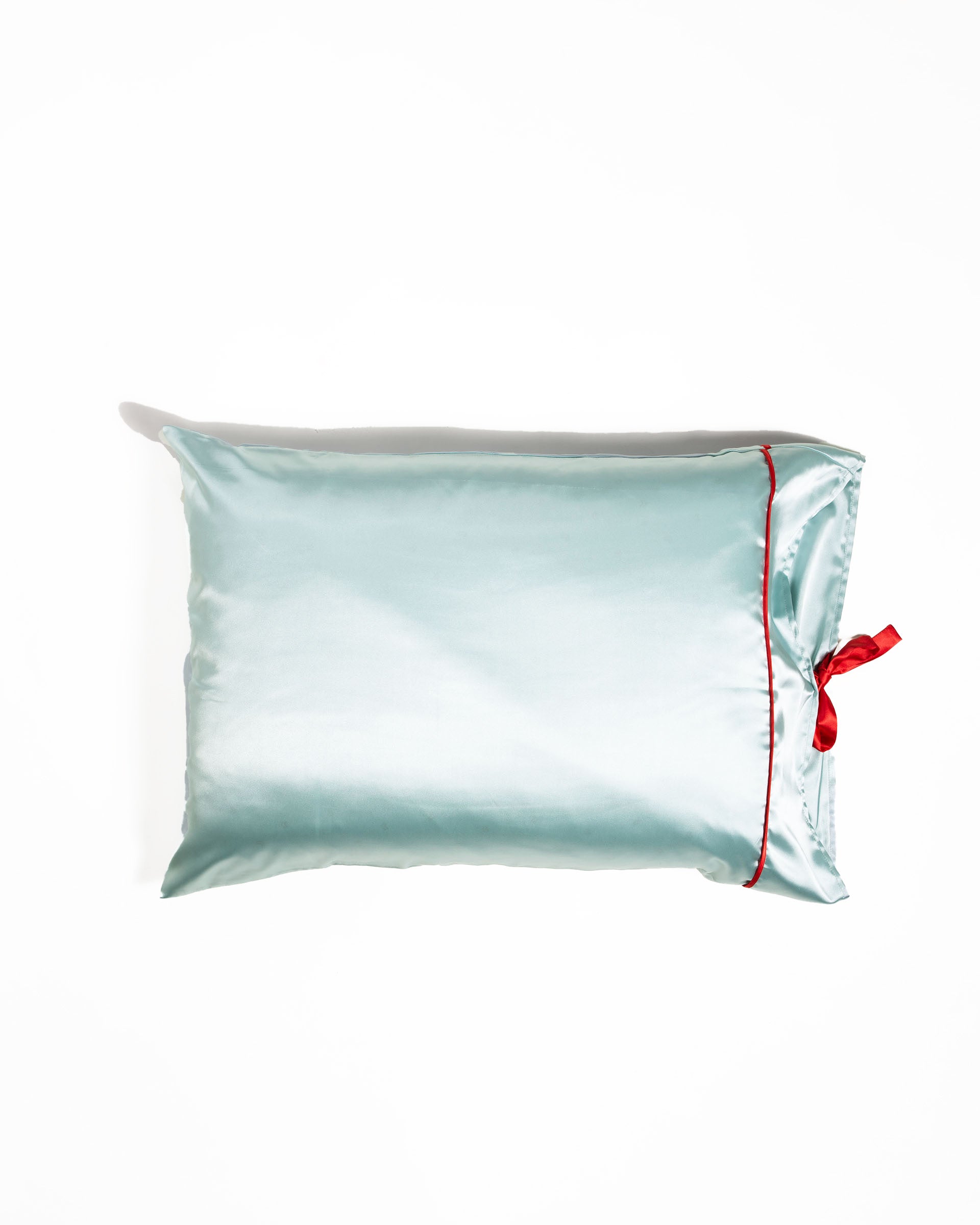 Mersea aquamarine satin sailor pillowcase against white background