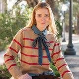 Cappuccino and crimson striped knit sweater with a denim collar and bow detail.