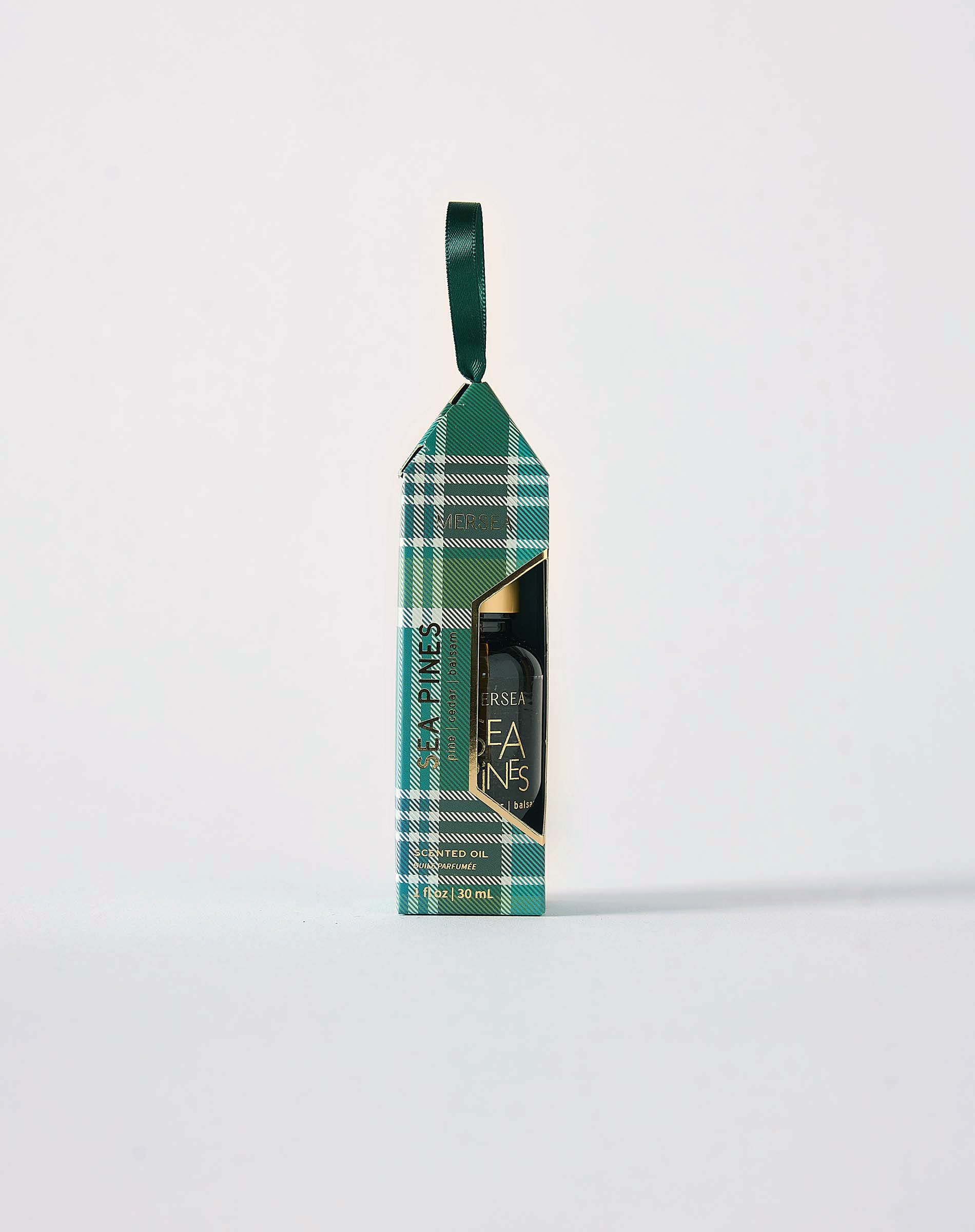 MERSEA women's travel-friendly sea Pines oil - 10ml travel-friendly roll-on perfume with a green plaid print and golden accents.