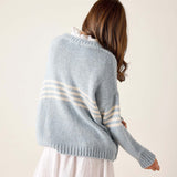 Soft sky and white striped knit sweater with ribbed cuffs