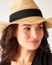close up of woman wearing seagrove straw hat