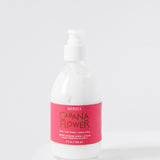 cabana flower shea lotion sitting on white stool