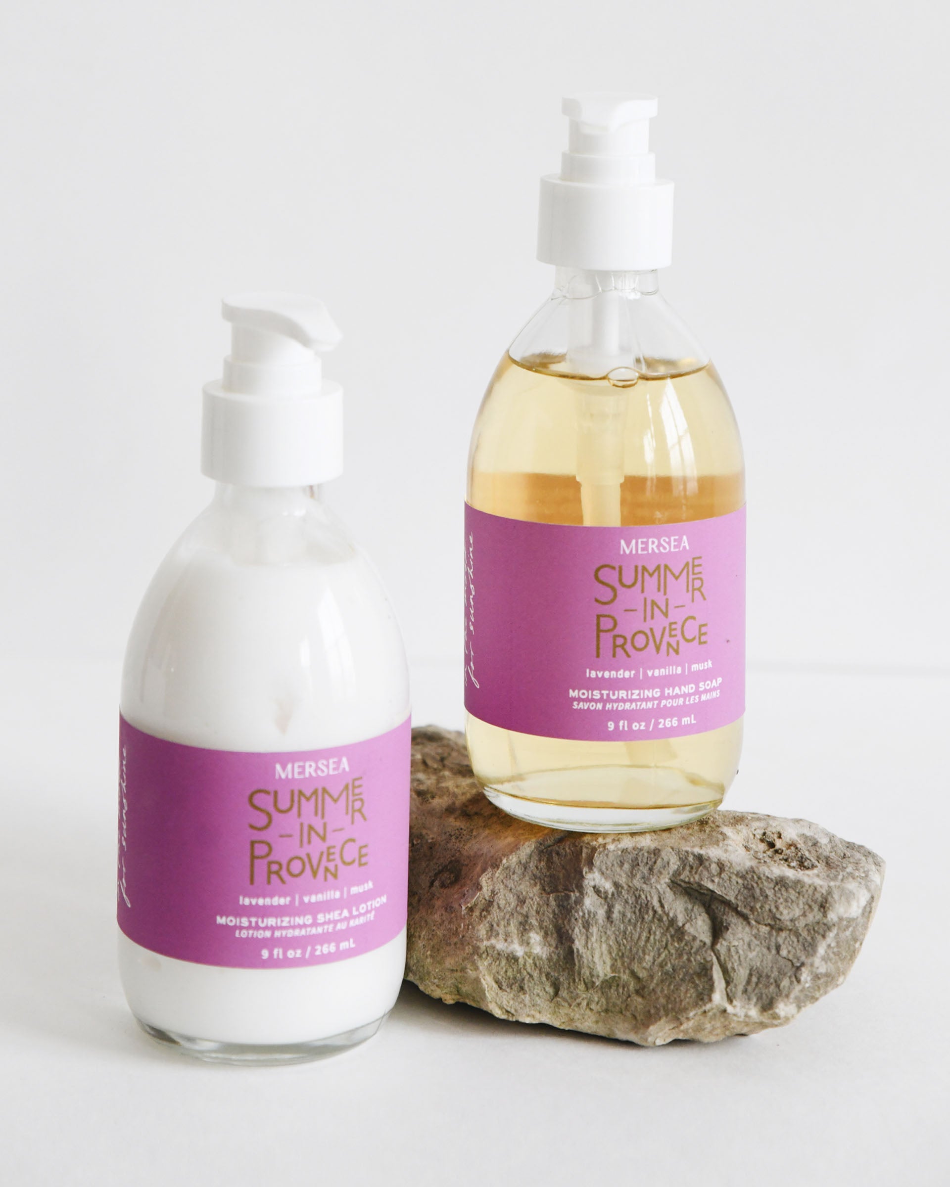 summer in provence shea lotion and hand soap sitting on a rock