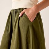 Hazel maxi skirt with a gathered waist and side pockets.