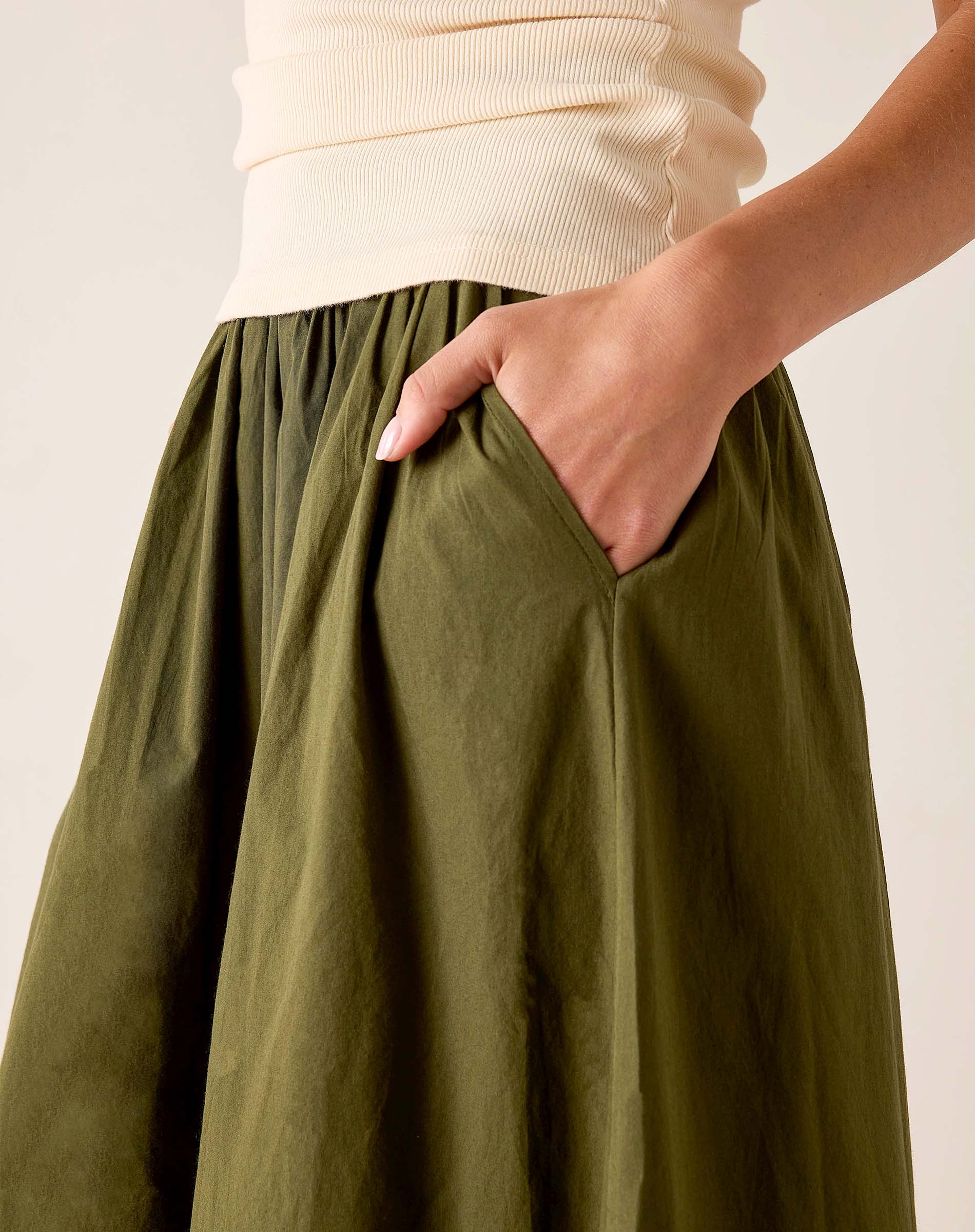 Hazel maxi skirt with a gathered waist and side pockets.