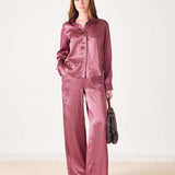 Women's travel-friendly rose gold polka dot silk blend set featuring a button-front shirt and wide-leg pants.