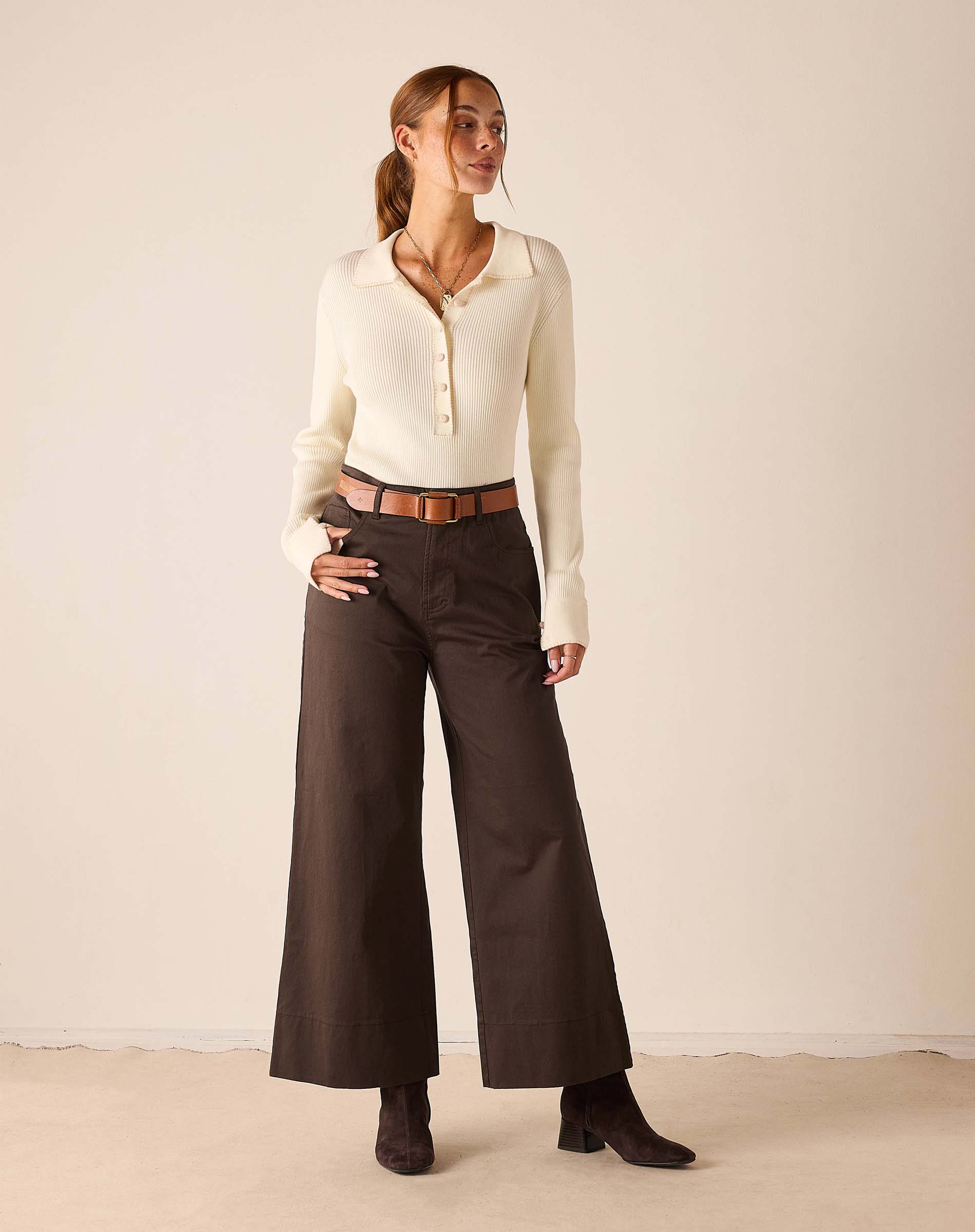 Ladies' travel-ready espresso brown wide-leg pants in a woven fabric with an elastic back and belt loops.