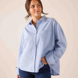 Oxford blue cotton button-down shirt with a relaxed fit and pointed collar.