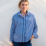 Tile blue striped button-up cotton shirt with a relaxed fit and long sleeves.