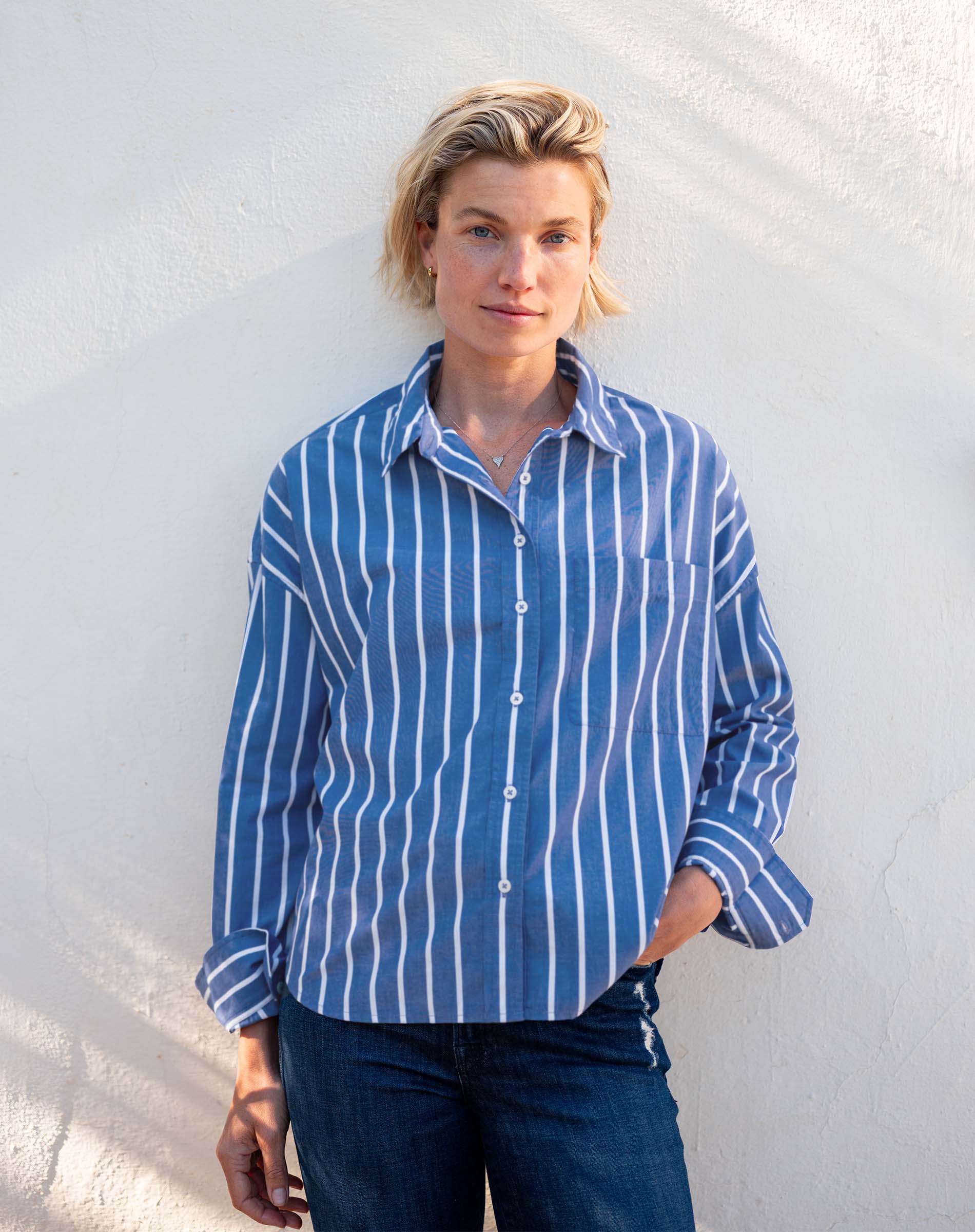 Tile blue striped button-up cotton shirt with a relaxed fit and long sleeves.