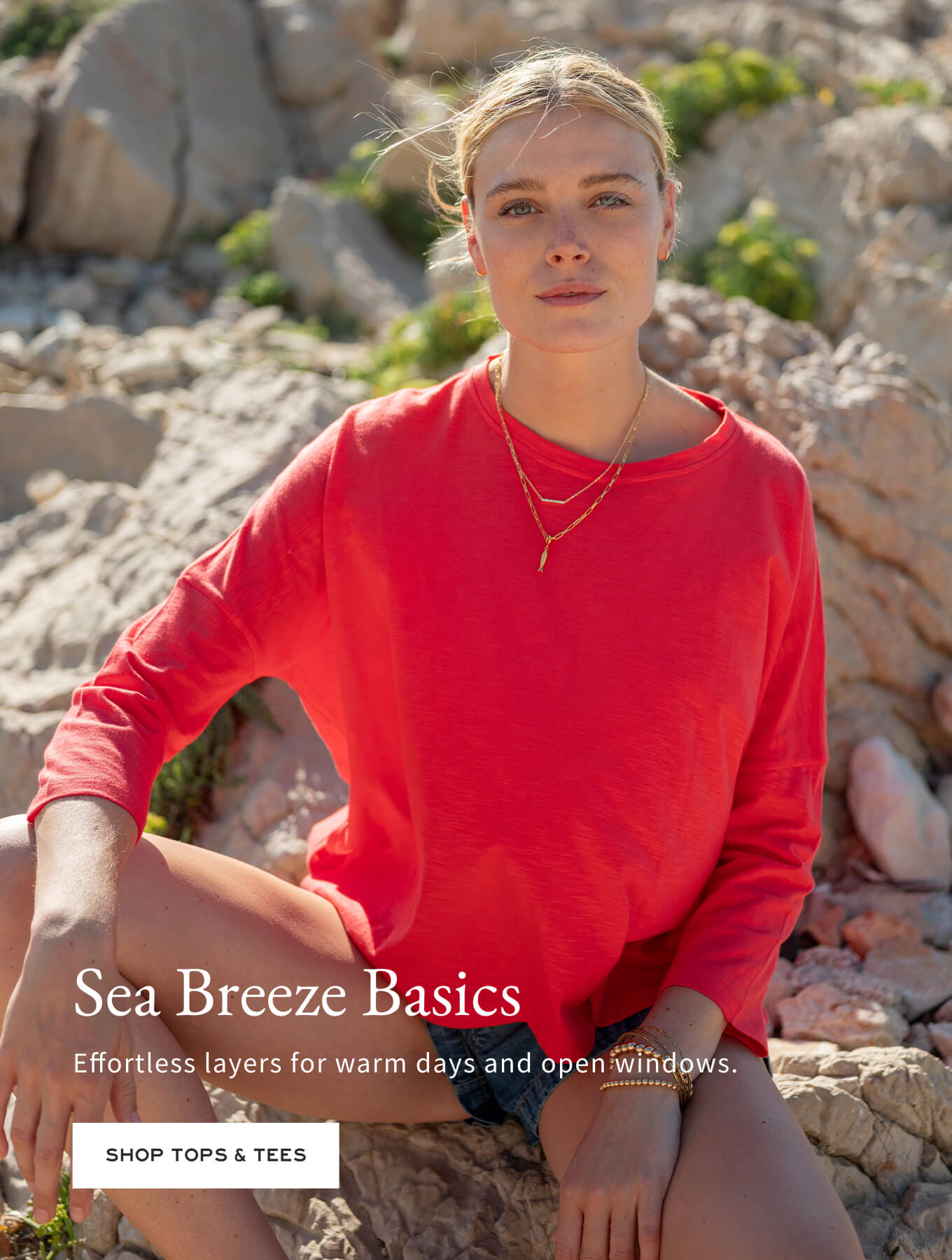 Woman in a red shirt sitting on rocks with promotional text overlay