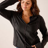 Graphite gray slim-fit knit polo tee with a buttoned placket and ribbed details.