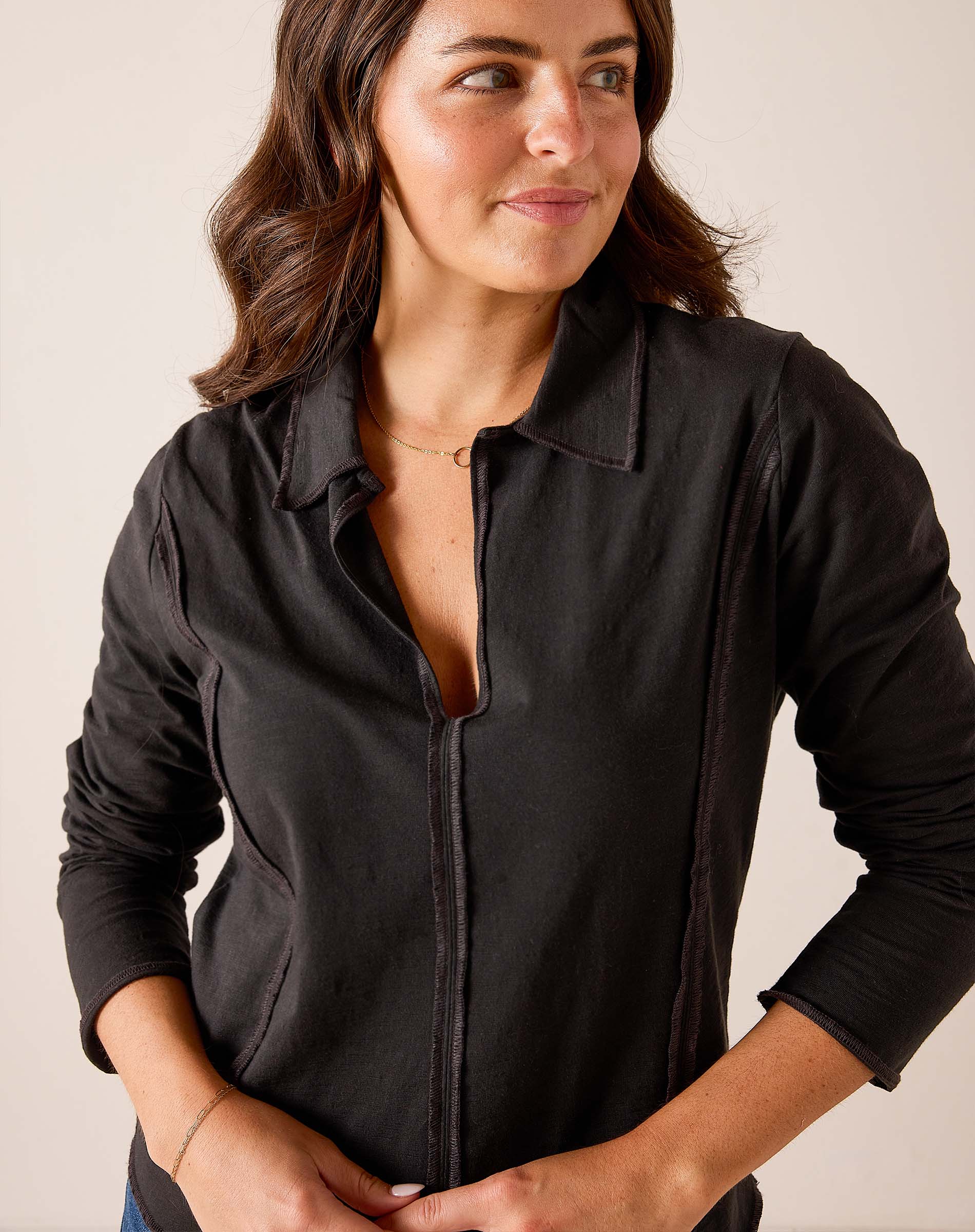 Graphite grey relaxed-fit jersey cotton polo tee with a buttoned collar and front zipper detail.