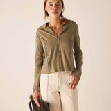 Nutmeg brown polo tee with a full-length zipper and ruffle details.