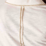 White cotton blend knit polo tee with a contrast trim and buttoned placket.