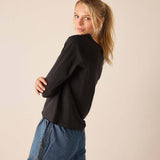 Graphite gray raglan tee with a relaxed fit and soft knit construction.