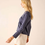 Navy blue raglan tee with a soft jersey feel and long sleeves.