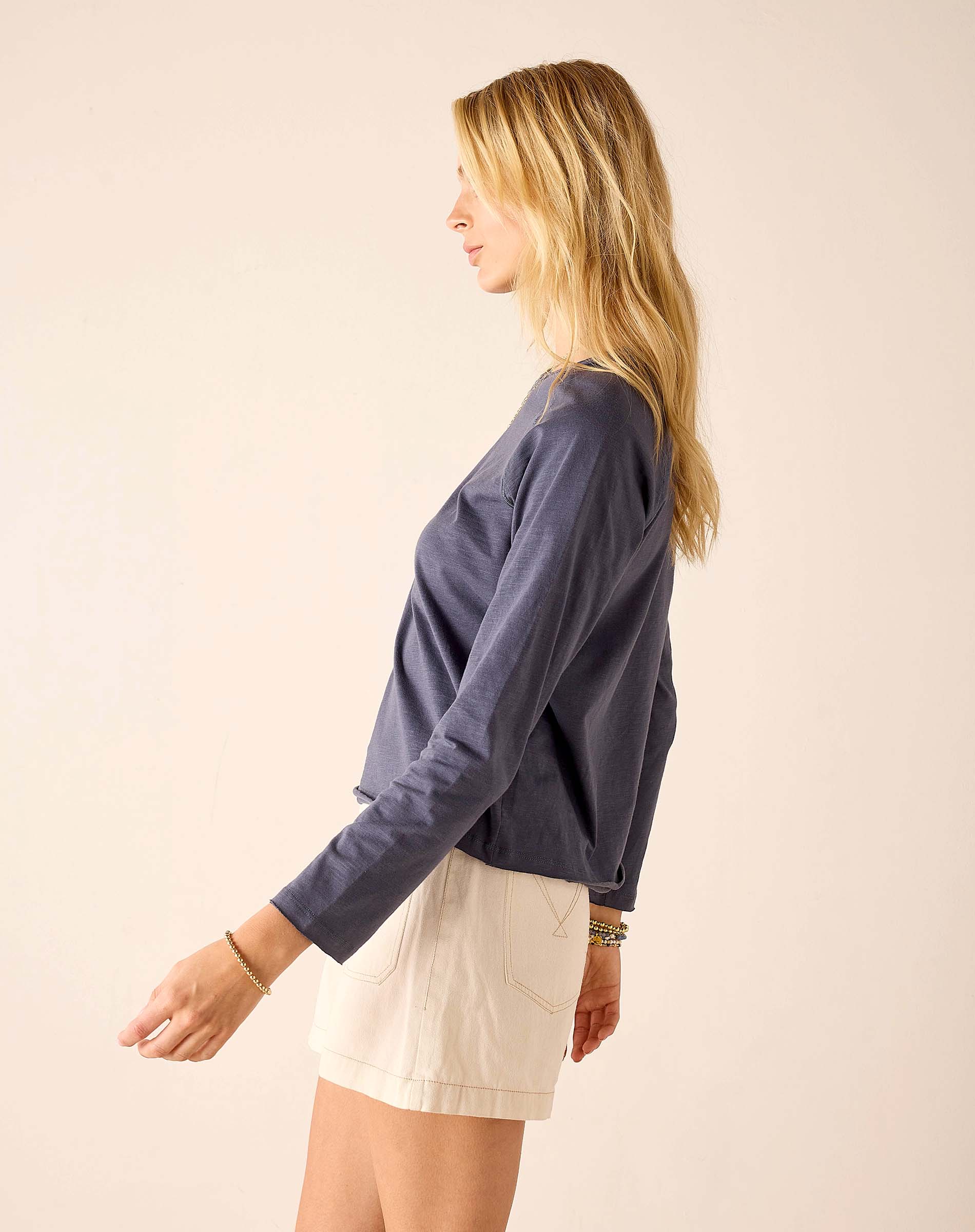 Navy blue raglan tee with a soft jersey feel and long sleeves.