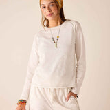 Ladies' travel-ready white raglan tee in a soft knit fabric.