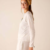 White relaxed fit linen blend raglan tee with drop shoulder detail.
