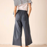 Atlas blue wide-leg linen pants with a relaxed fit and a back pocket detail.