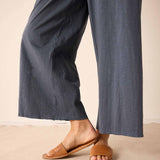 Atlas blue wide-leg linen blend trousers featuring a relaxed fit and comfortable drawstring waist.