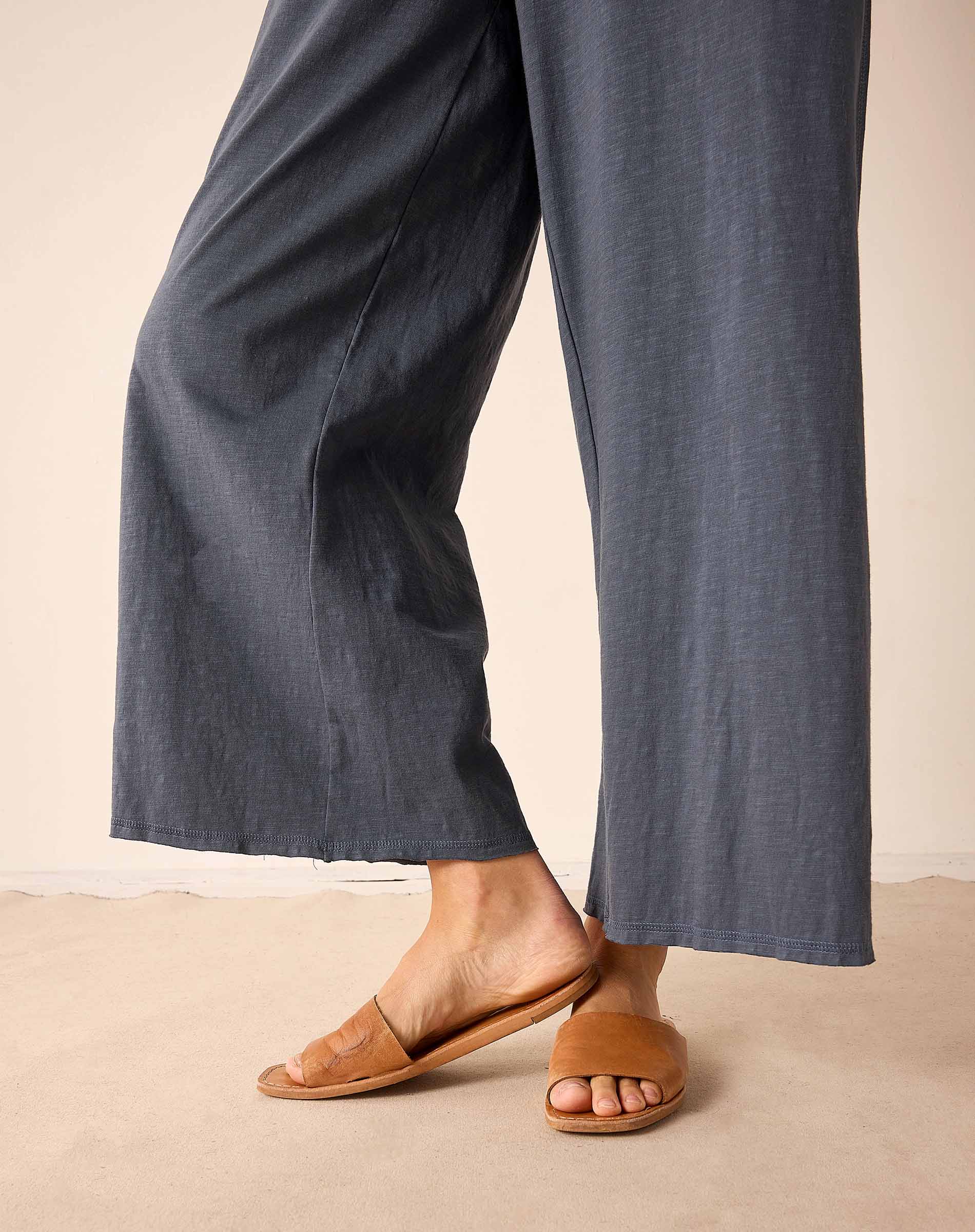 Atlas blue wide-leg linen blend trousers featuring a relaxed fit and comfortable drawstring waist.