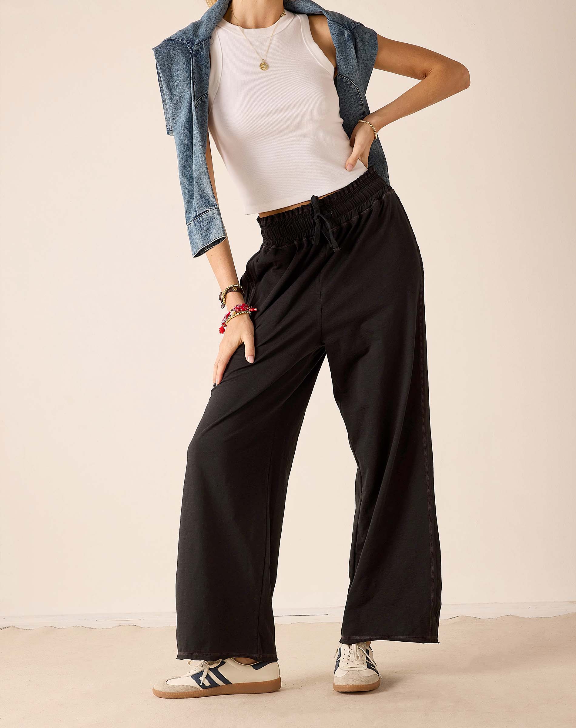 Graphite gray relaxed fit wide-leg pants.