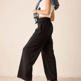 Graphite wide-leg trousers in a soft woven fabric.