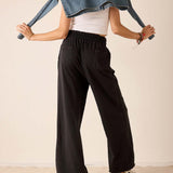 Graphite grey relaxed fit jersey cotton tee and wide-leg pants set.