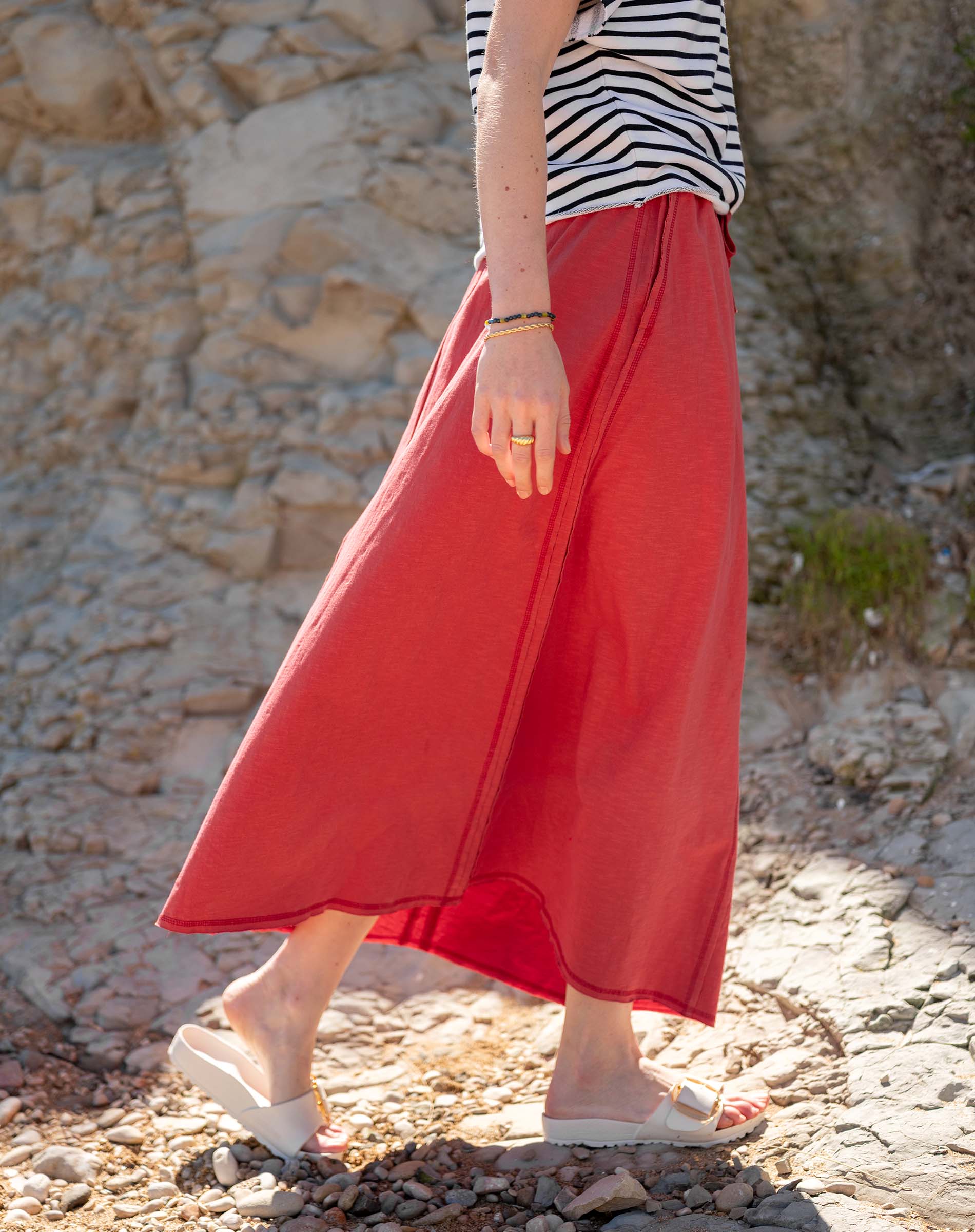 Cayenne red linen maxi skirt with a relaxed fit and gathered waist.