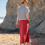 Horizontal striped tee in navy and white paired with a wide-leg cayenne linen skirt.