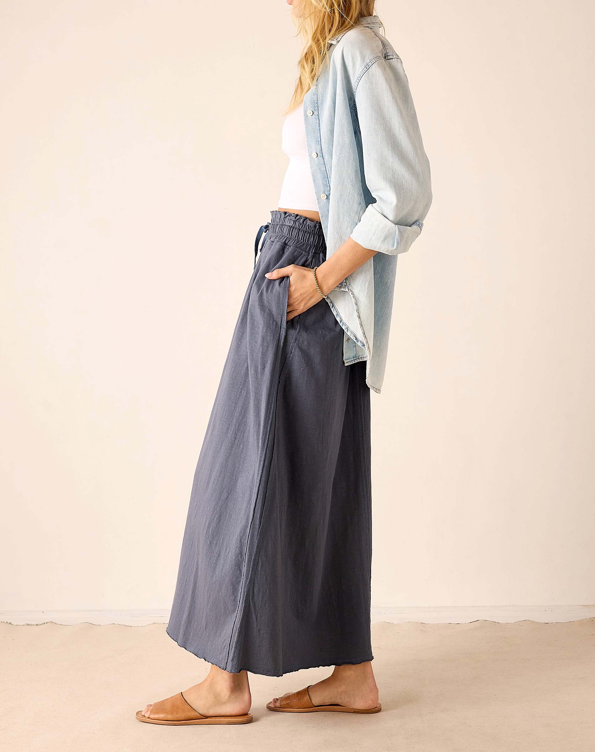 Navy blue oversized linen skirt with a front seam detail.
