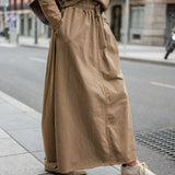 Nutmeg brown linen blend maxi skirt with an elasticated waist and gathered detail.