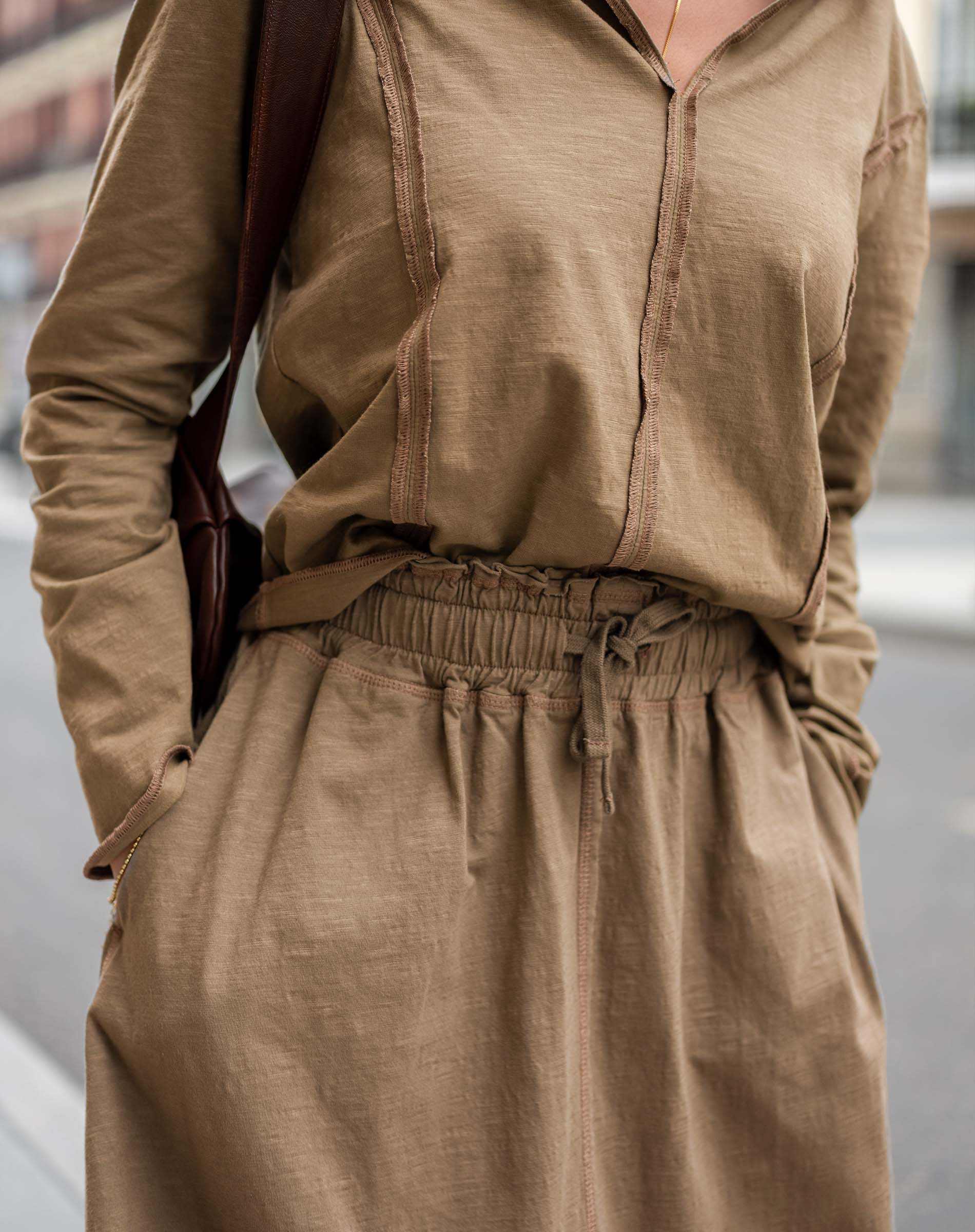 Nutmeg brown linen blend tee and matching skirt with pleated front detail.