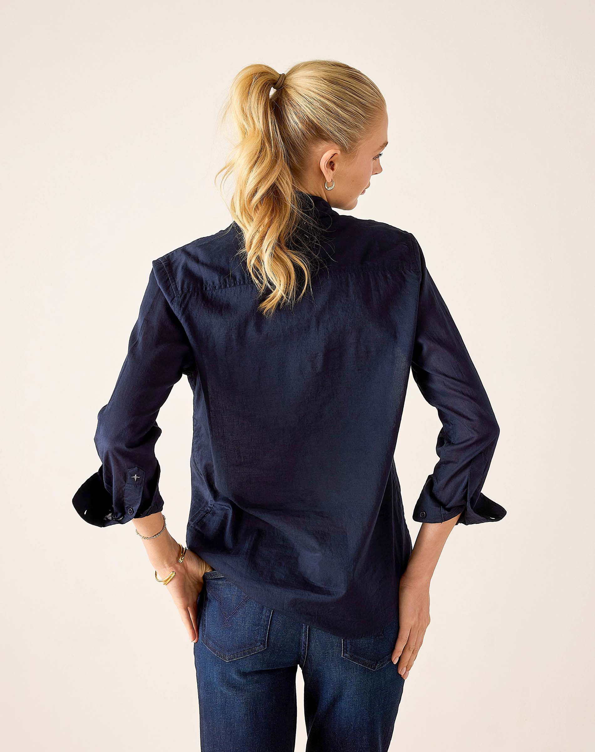 Navy blue tuxedo ruffle shirt with statement cuffs and relaxed fit