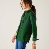 Pine green linen tuxedo shirt with ruffle detailing and 3/4 sleeves.