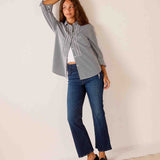 Soft black pinstripe relaxed fit tunic shirt with ruffled tuxedo-style detailing.