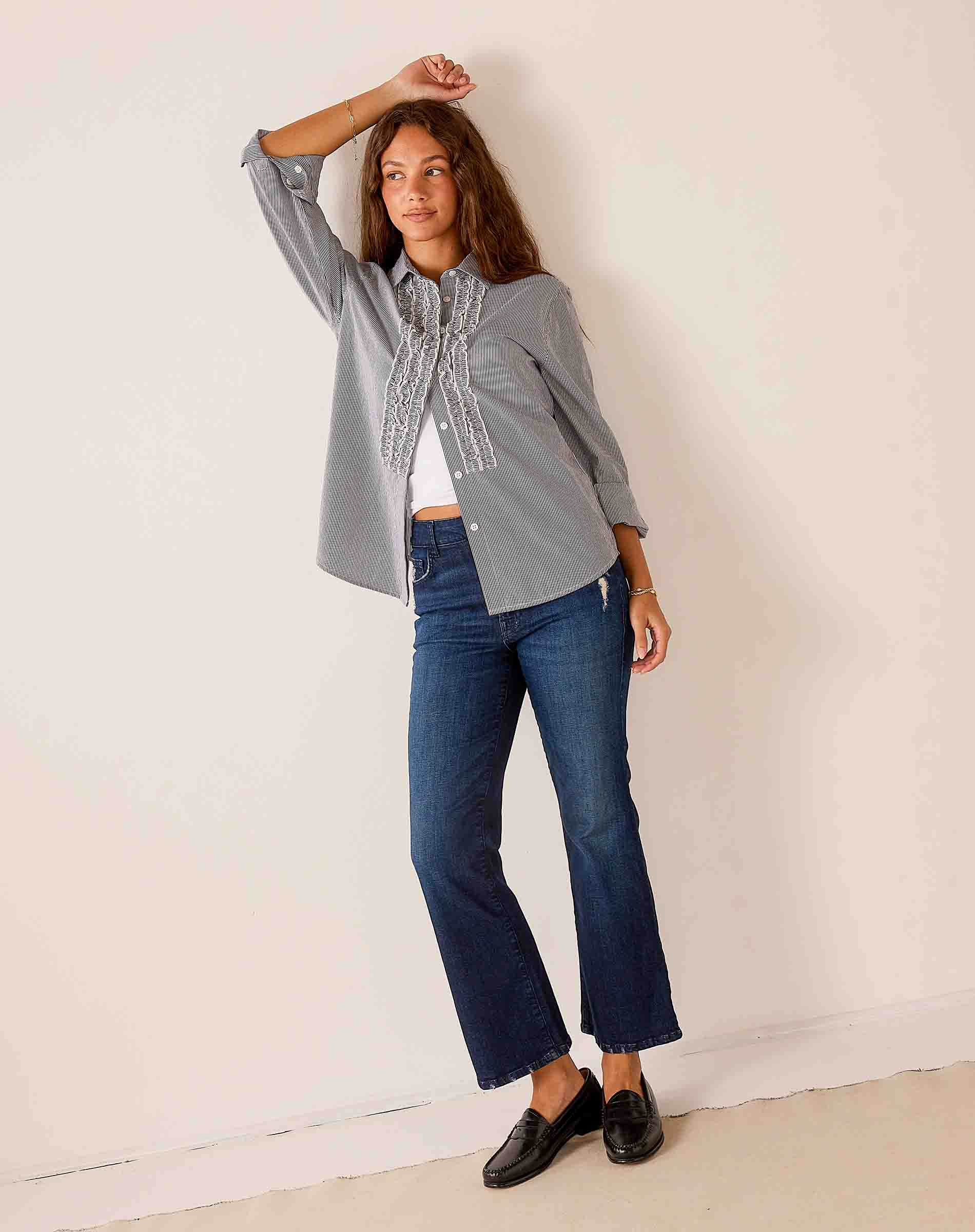 Soft black pinstripe relaxed fit tunic shirt with ruffled tuxedo-style detailing.