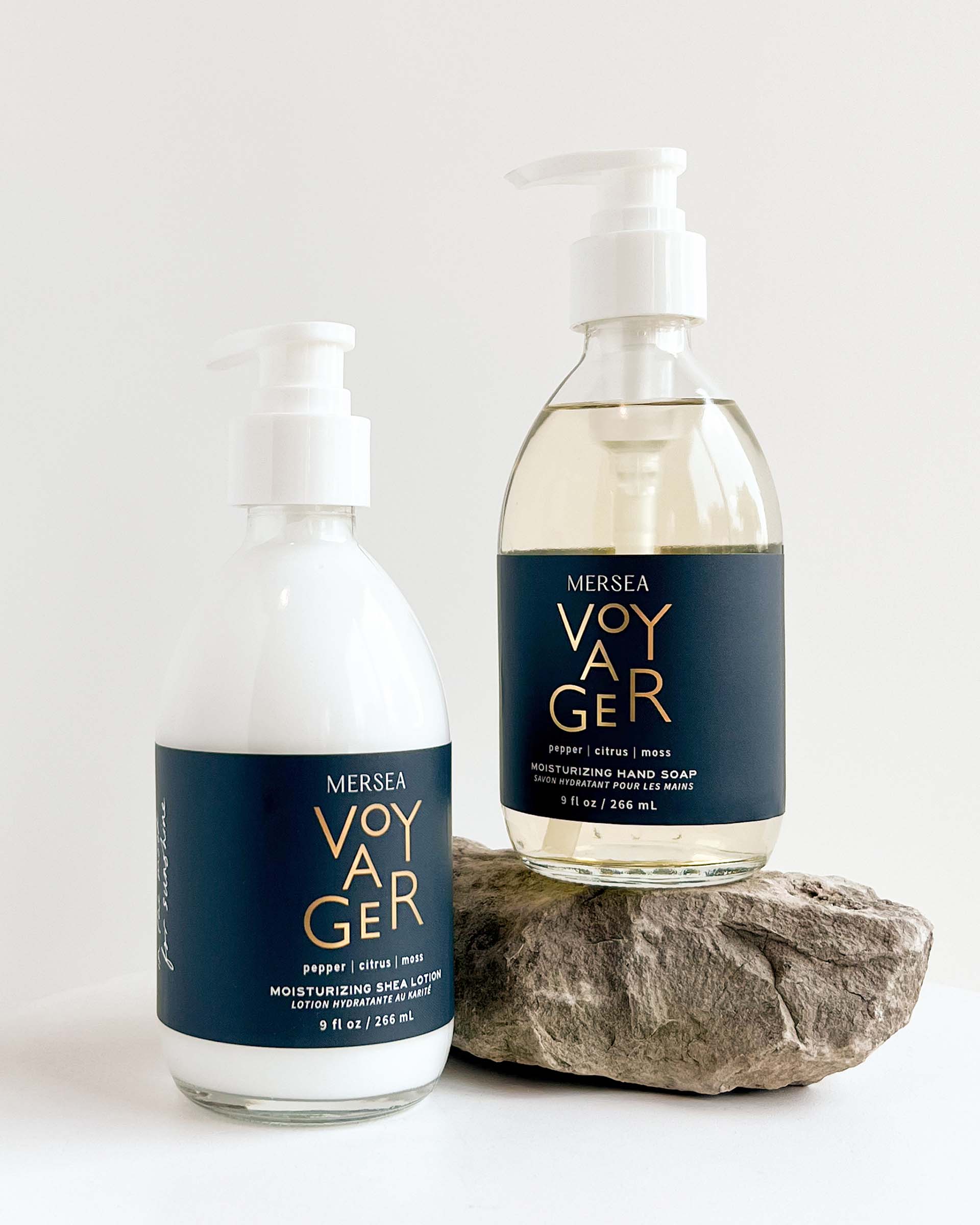 voyager liquid hand soap and shea lotion laying on a white background