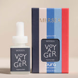 MERSEA Voyager fragrance bottle and packaging on a beige background