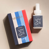Mersea Voyager fragrance bottle and packaging on a beige background