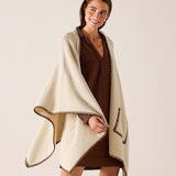 Cream wrap with a bronze whipstitch edge.