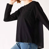 Women's Black Front Pocket Pleated Back Crew Neck Long Sleeve Tee Side View Front Pocket Detail