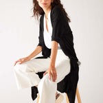 Womens Black Lightweight Cuffed Elbow Length Sleeves Duster Sitting Side View