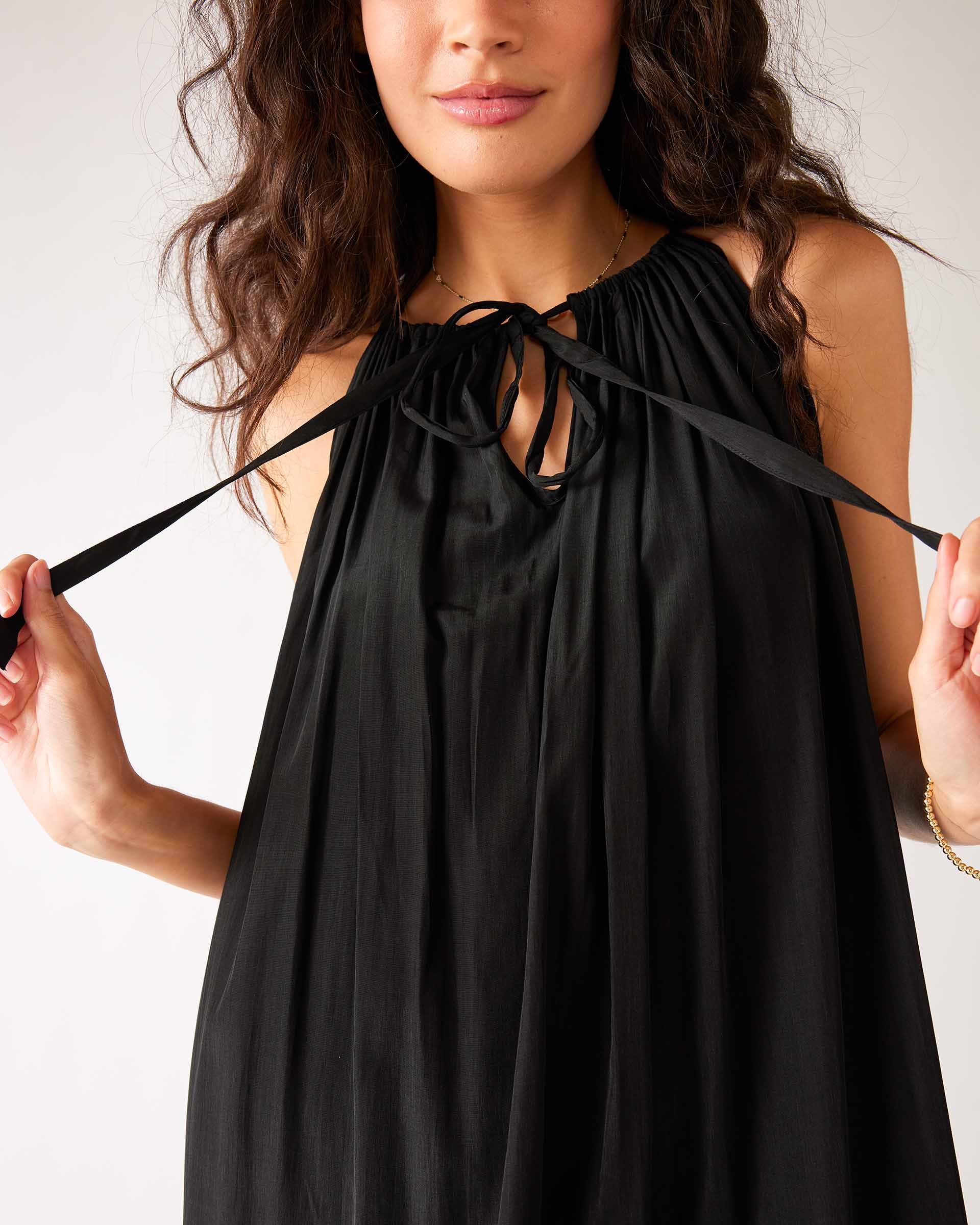 Women's Black Loose Fit Pullover Maxi Dress Close-up Front View of Neckline Detail