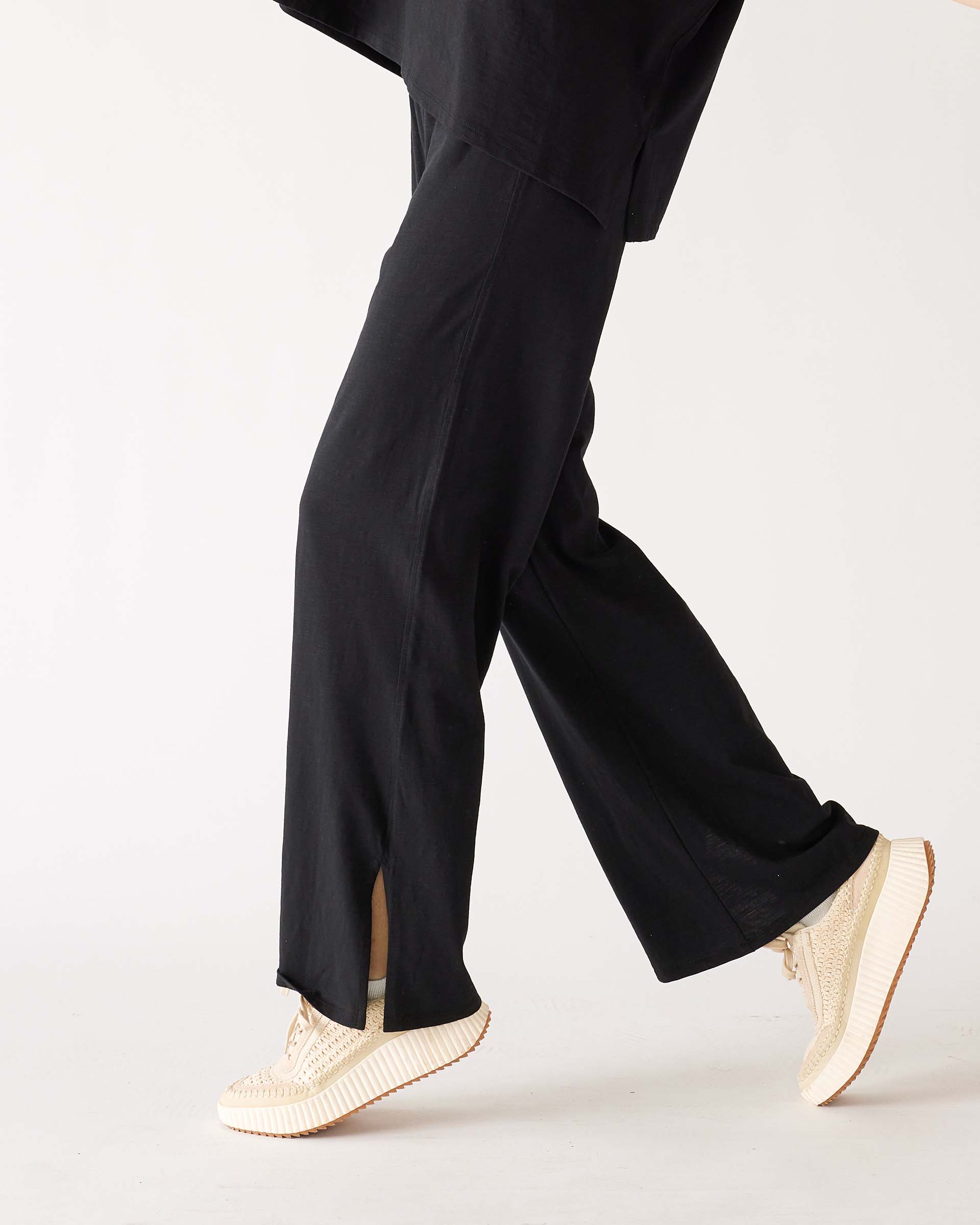 Women's Black Wide Leg Ankle side Slit Elastic Waist Pant Side View Walking